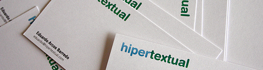 Different font weights and sizes on business cards.